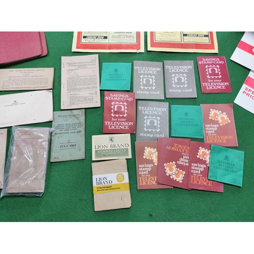 58 - Two boxes full of ephemera cleared from a post office inc quantity of post office items, quantity of... 