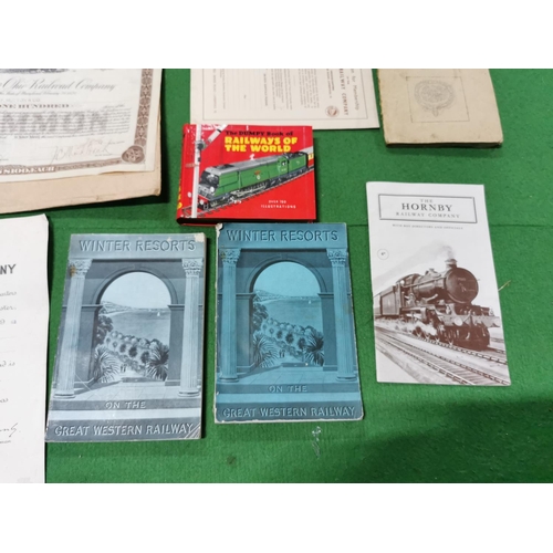 66 - Ephemera relating to trains inc two GWR winter resort books, share certificate for a railroad compan... 