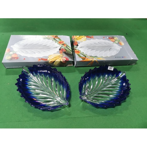 67 - Pair of Walther Glas boxed blue and clear glass crystal leaf formed serving platter, 41cm long