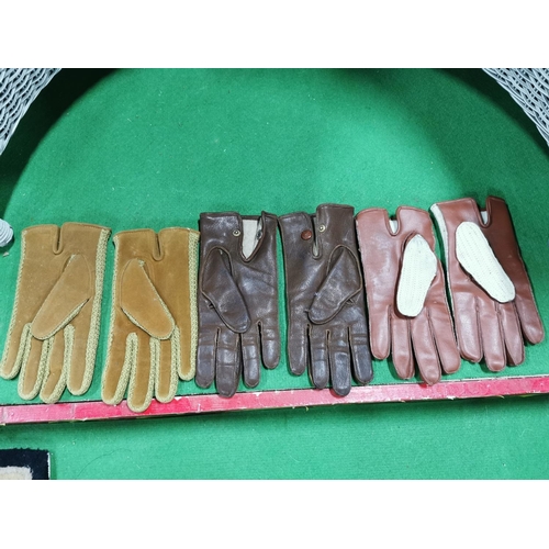 69 - Three pairs of vintage driving gloves