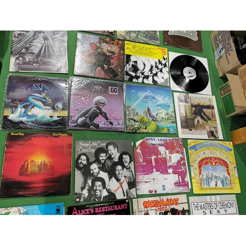 81 - Quantity of vinyl records some good bands inc David Bowie, Queen, Asia, Dire Straights etc