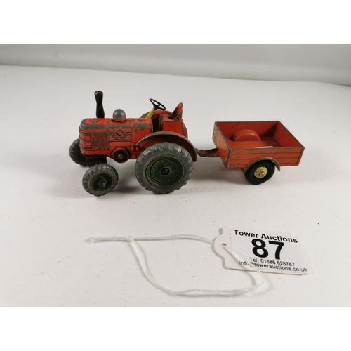 87 - Dinky 301 Field Marshall tractor and trailer