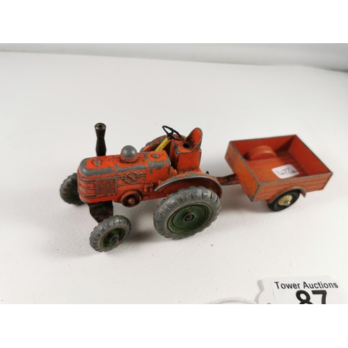 87 - Dinky 301 Field Marshall tractor and trailer