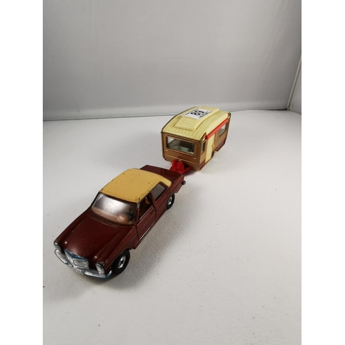 89 - Corgi Mercedes Benz 240D and matching caravan