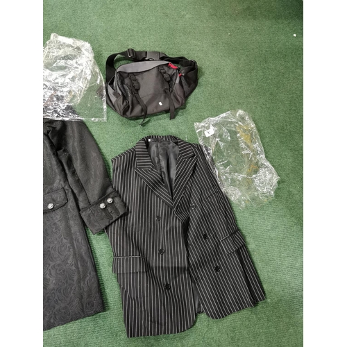 10 - Two new and unused items of clothing inc a XXl waistcoat and an XL steampunk jacket along with a bag