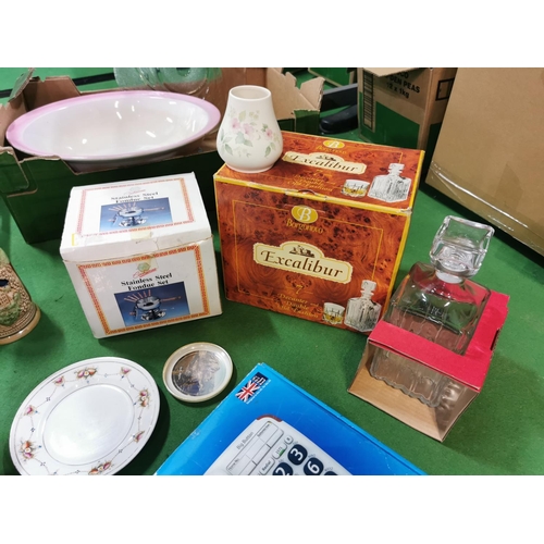 39 - Two large boxes of odds inc a  large boxed decanter set, clocks, figures etc.