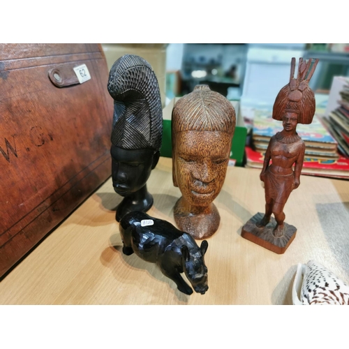 63 - Quantity of ethnic figures inc an ethnic wooden lamp that needs rewiring