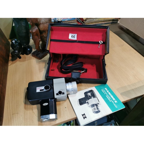 66 - Cased Haminex Loadmatic MP400 super 8 camera in good condition, case has its key