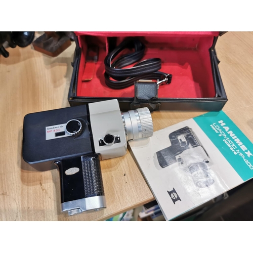 66 - Cased Haminex Loadmatic MP400 super 8 camera in good condition, case has its key