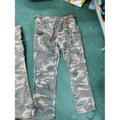 8 - 4 pairs of camouflage combat trousers all size 40w, all in excellent condition