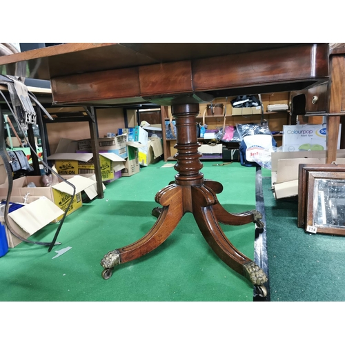 362 - George iii period solid mahogany games table folding top revealing storage under. Pedestal legs bras... 