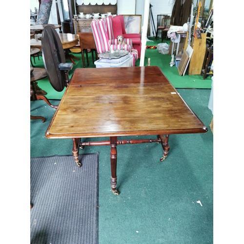 378 - Georgian Gate leg table mahogany brass and porcelain casters good order 75cm high, 95cm wide, 30cm d... 