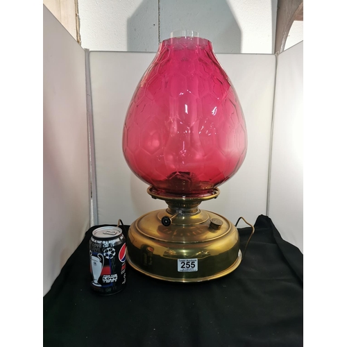 275 - Nice quality Victorian Juno brass oil lamp heater with a very large cranberry glass shade all in goo... 