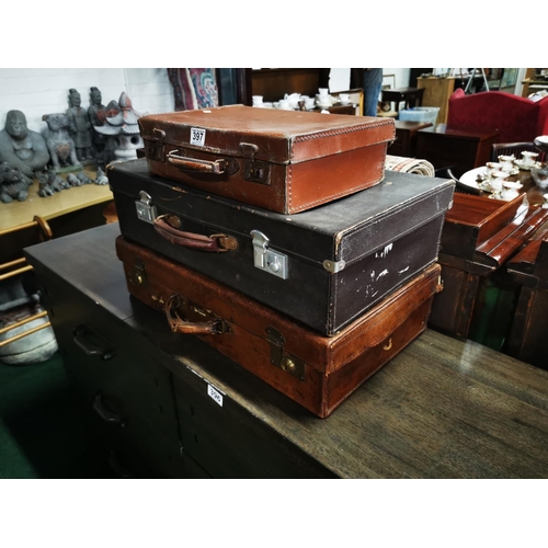 413 - Three vintage suitcases