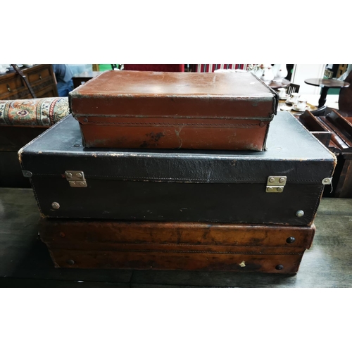 413 - Three vintage suitcases