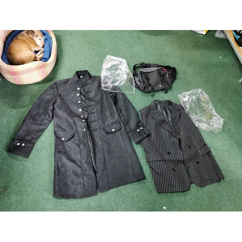 10 - Two new and unused items of clothing inc a XXl waistcoat and an XL steampunk jacket along with a bag