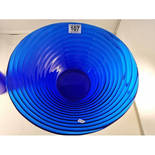 107 - Large art glass blue swirl bowl along with a matching blue glass vase, diameter of the bowl is 12inc... 