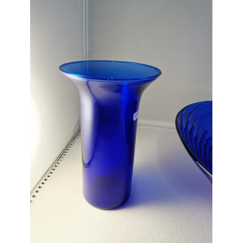 107 - Large art glass blue swirl bowl along with a matching blue glass vase, diameter of the bowl is 12inc... 