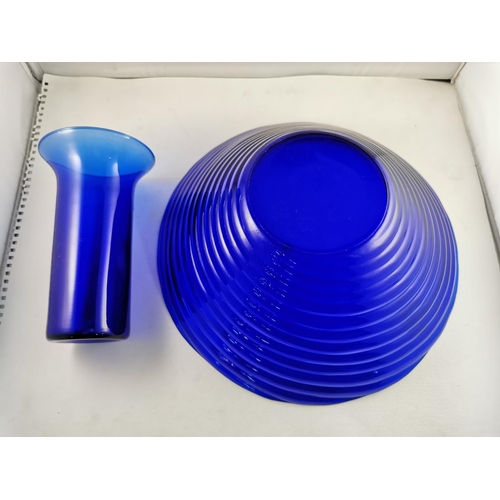 107 - Large art glass blue swirl bowl along with a matching blue glass vase, diameter of the bowl is 12inc... 