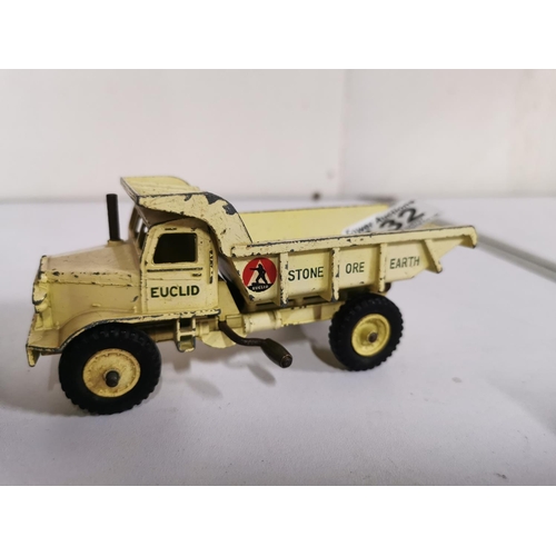 132 - Corgi smiths kKarrier van missing its tyres and a dinky 965 Euclid rear dump truck