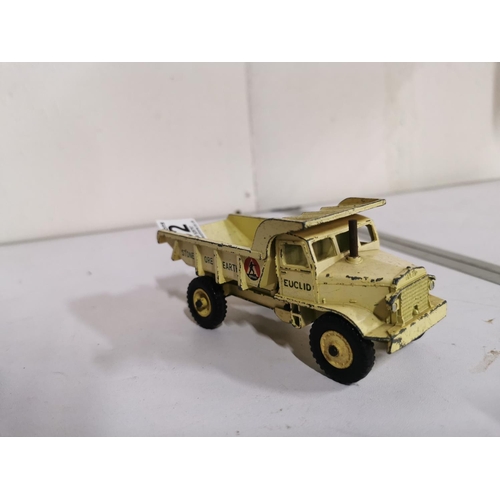 132 - Corgi smiths kKarrier van missing its tyres and a dinky 965 Euclid rear dump truck