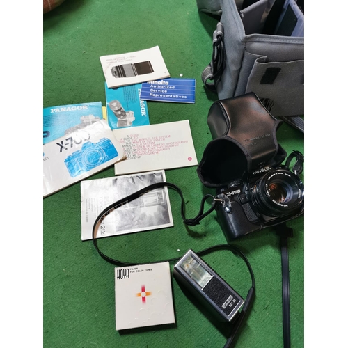 161 - Minolta X700 in case with instruction booklets comes with two extra Panagor lenses and includes Meca... 