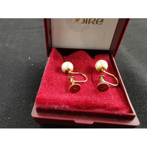 193 - Pair of 9ct gold genuine pearl screw back earrings