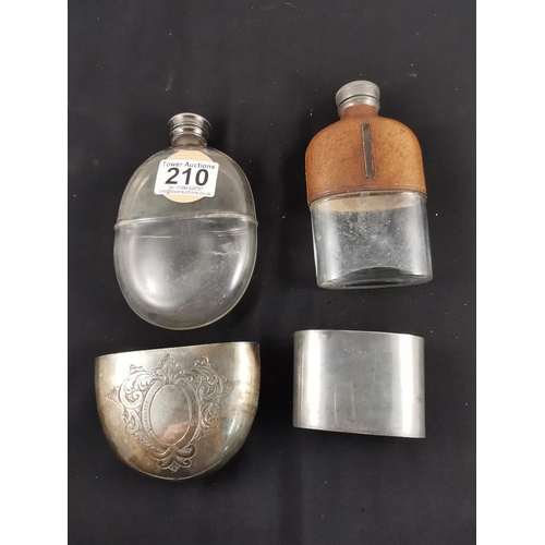 210 - Two antique plated hip flasks