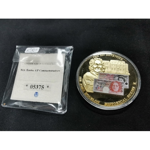 220 - Gold plated coin commemorating the £50 bank note in its capsule with a COA