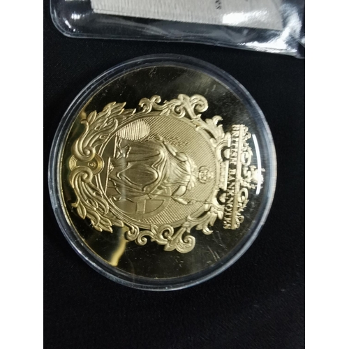 220 - Gold plated coin commemorating the £50 bank note in its capsule with a COA