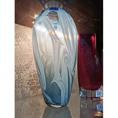 241 - Two large art glass vases a blue swirl vase and a red twist vase, height of blue vase 37cm width 18c... 