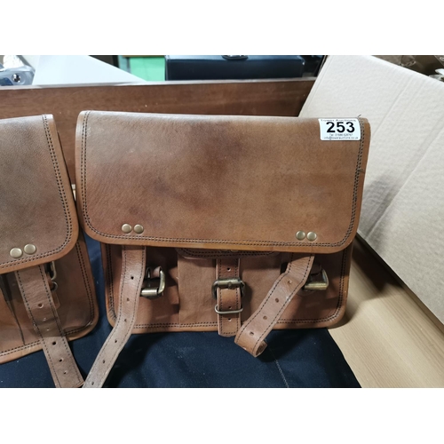 253 - Two good quality vintage leather panier bags in good condition