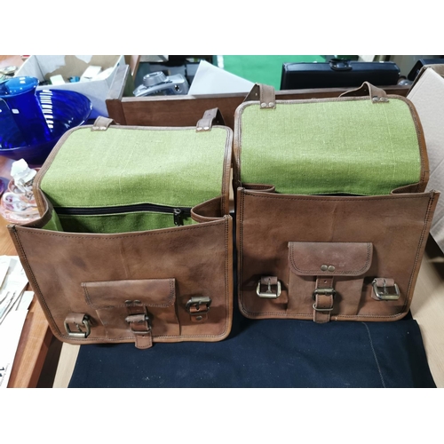 253 - Two good quality vintage leather panier bags in good condition