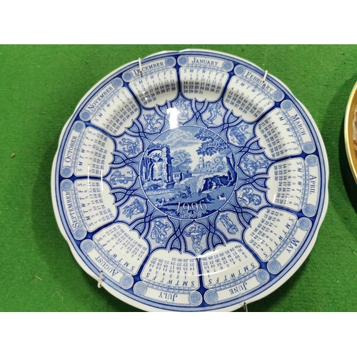 254 - Four collectable plates inc a Royal Copenhagen 1969 plate and a Spode calendar plate etc