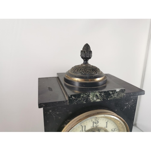 274 - Antique slate and marble mantel clock by Ansonia with a visible escapement to the front and an acorn... 