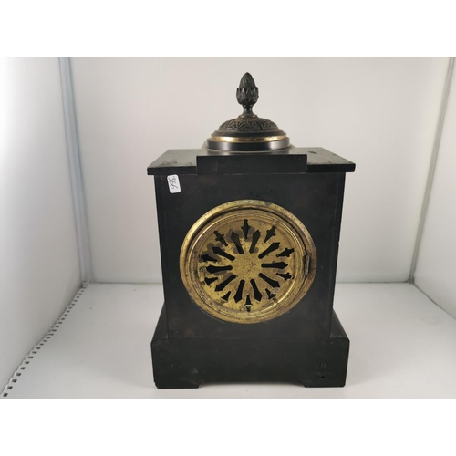 274 - Antique slate and marble mantel clock by Ansonia with a visible escapement to the front and an acorn... 