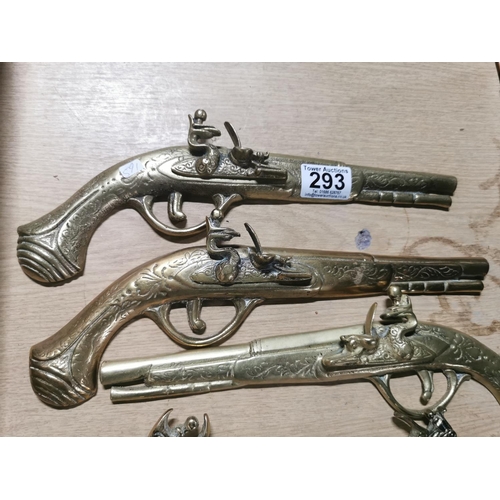 293 - Quantity of seven solid brass wall hanging decorative pistol's