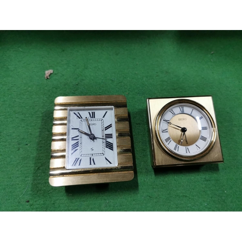 308 - Box full of clocks inc two Seiko travel clocks a Bentima wall clock, Metamec carriage clock etc