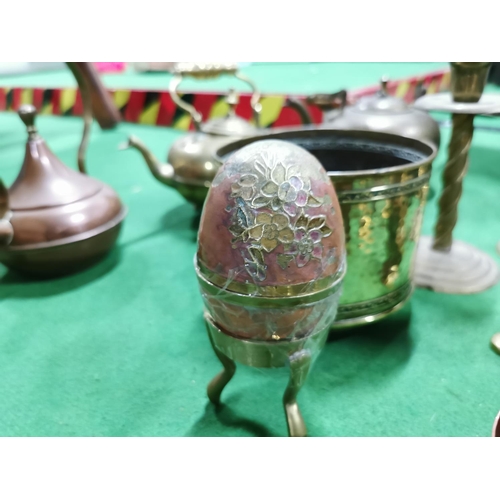 309 - Two boxes full of brass and copper ware inc a brass canon three teapots enamelled egg solid brass ca... 