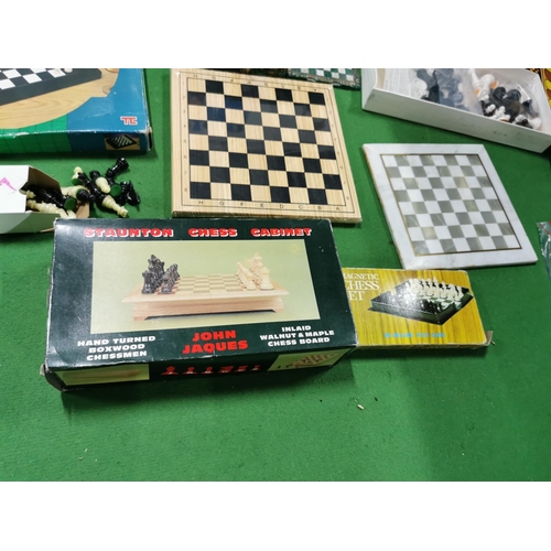 314 - Box full of various chess games