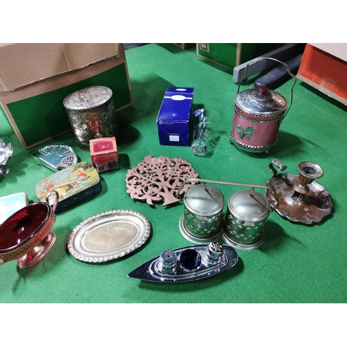 316 - Two boxes full of metal ware inc large quantity of candle holders and candles and a good quantity of... 