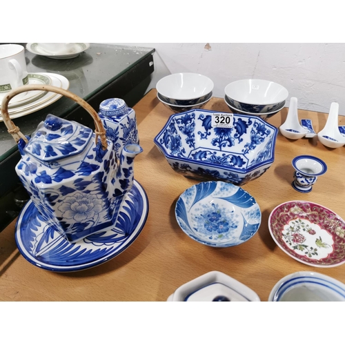 320 - Quantity of blue and white oriental china inc lidded pots, teapots, bowls, Saki set etc