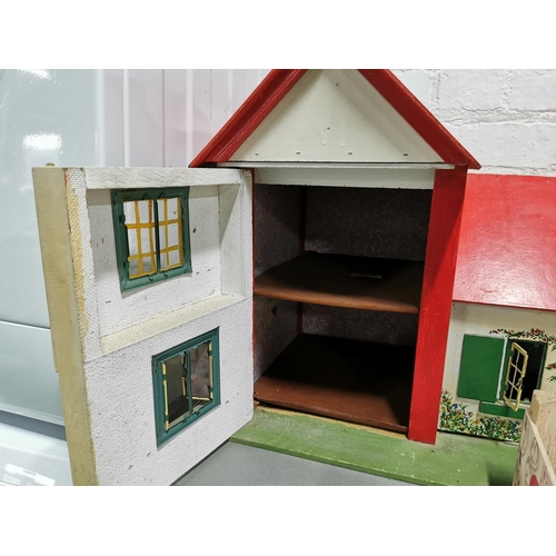 322 - Wooden dolls house with a quantity of dolls house furniture and accessories etc