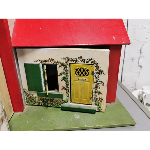 322 - Wooden dolls house with a quantity of dolls house furniture and accessories etc