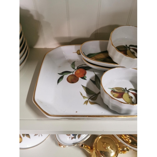 404 - A comprehensive Royal Worcester Evesham pattern dinner 76 pieces inc, tureens, placemat and coaster ... 