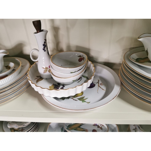 404 - A comprehensive Royal Worcester Evesham pattern dinner 76 pieces inc, tureens, placemat and coaster ... 