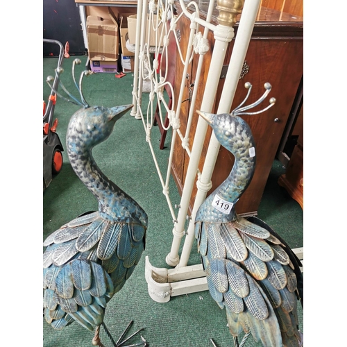 419 - Pair of tall metal garden ornaments with glass bead tails 94cm tall by 63cm