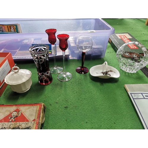 42 - Large box of odds inc quantity of coloured glassware and various board games inc an early 1940's Mon... 