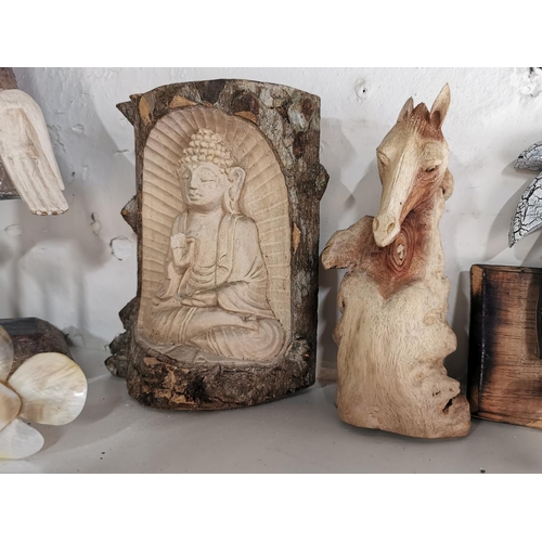 420 - Quantity of wooden items inc two buddhas M.O.P. fish, horses head etc