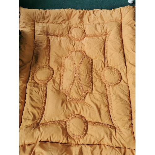 423 - Small double orange eiderdown in good clean condition just two small holes